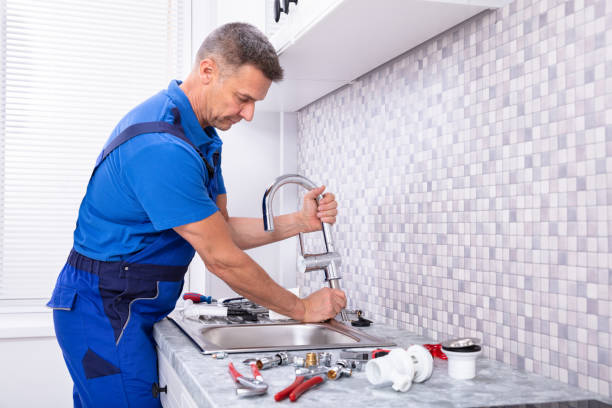 worker-fixing-water-tap.png